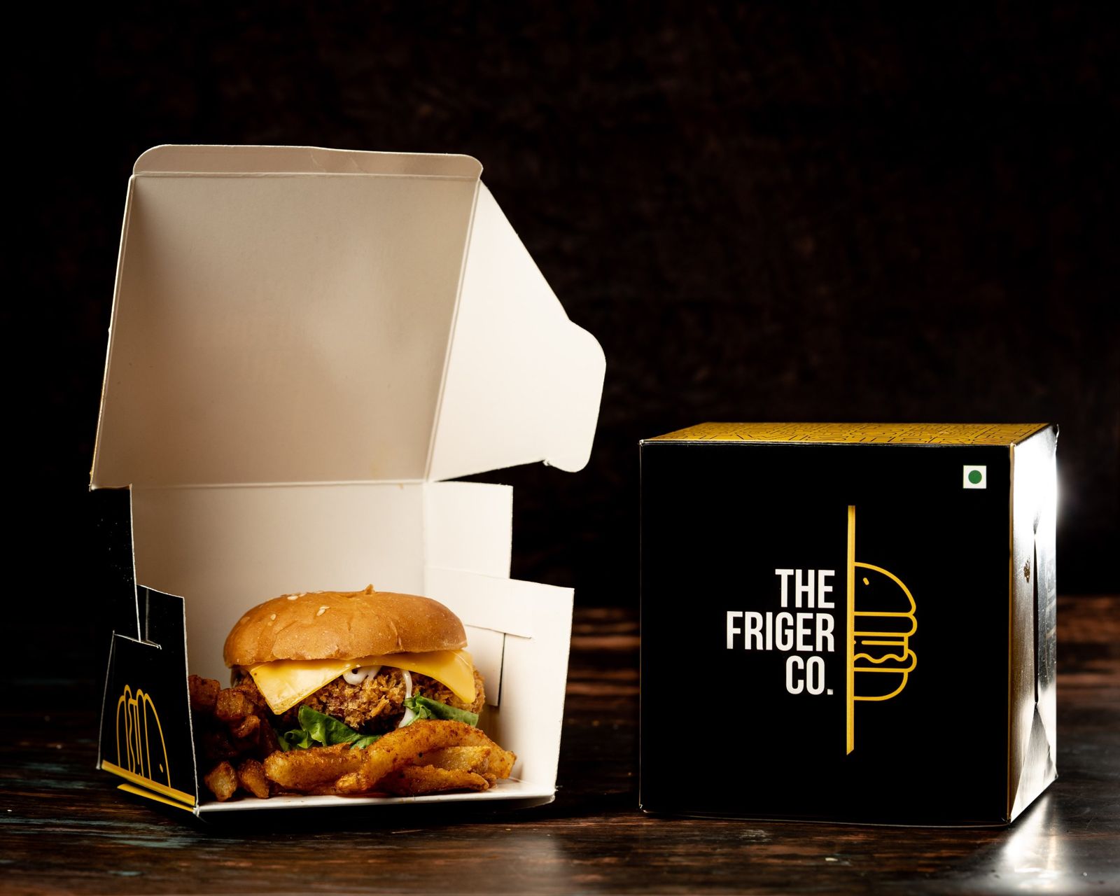 Crispy chicken burger with cheese in a Friger box